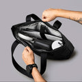 ALPAKA Flight Tote (L) 內部展示，包括 16 吋筆記型電腦隔層與水壺袋。